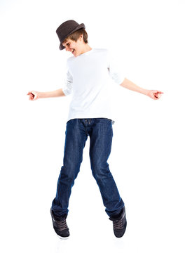 Boy dancing with a hat