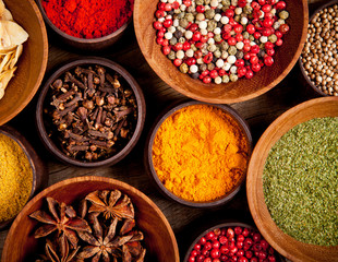 Various kind of spices in wooden bowls © Jag_cz