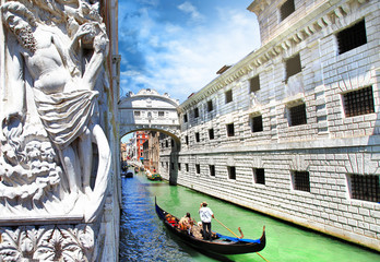 Venice --gondolas passing over Bridge of Sighs