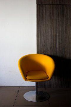 Yellow chair in the room