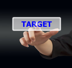 Obraz premium woman hand touching button target
