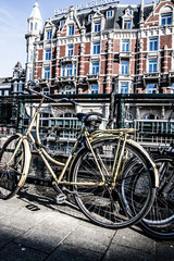 Obraz premium Typical Amsterdam architecture with bikes