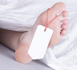 Dead body with toe tag