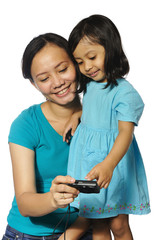 Mother And Daughter Taking Own Photograph