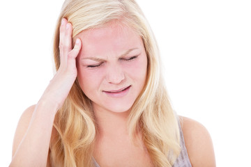 Fototapeta premium Attraktive junge Frau klagt über Kopfschmerzen