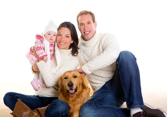 Baby girl mother and father family happy in winter and dog