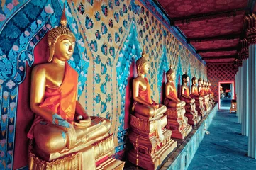 Photo sur Plexiglas Bangkok statues dorées de Bouddha dans le temple Wat Arun, Bangkok