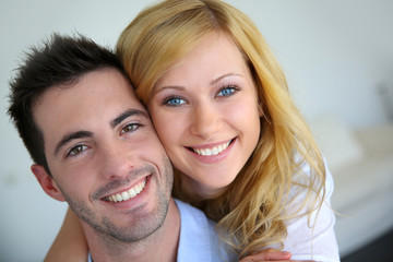 Cheerful in love couple at home