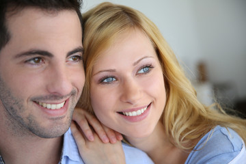 Cheerful in love couple at home