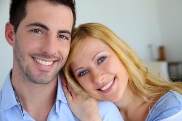 Cheerful in love couple at home