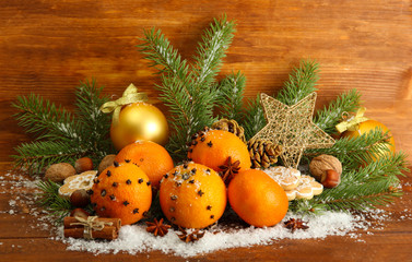 christmas composition with oranges and fir tree,