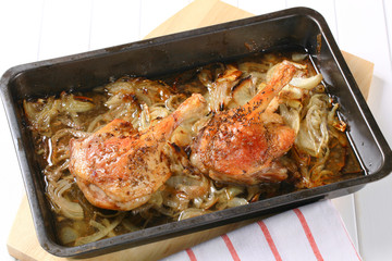 Roast duck legs with caraway and onion