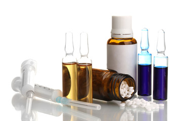 medical ampules, bottle and syringes, isolated on white