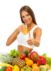 beautiful young woman with fruits and vegetables and glass of