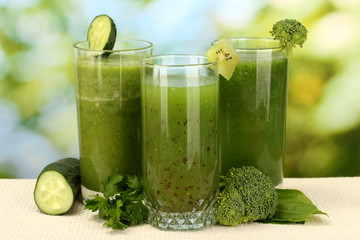 Three kinds of green juice on bright background