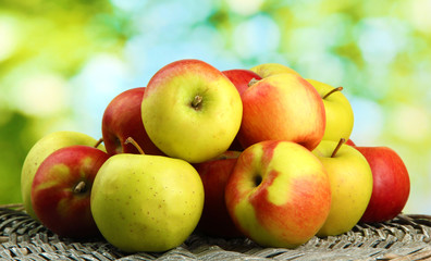 juicy apples, on green background