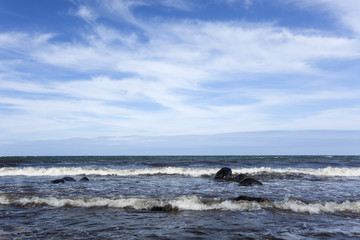 Ocean scene, southern of Sweden, nice blue sky with white clouds