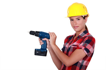 Tradeswoman holding a power tool