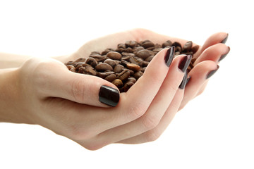 female hands with coffee beans, isolated on white