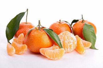 Ripe sweet tangerine isolated on white