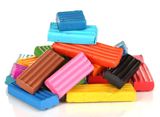 Children bright plasticine isolated on white