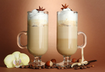 Fragrant coffee latte in glasses cups with spices,