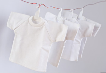 Dry white t-shirts with coat hanger