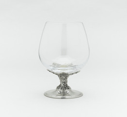 Whisky or brandy glass decorated by pewter in shape of grape