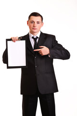 young business man showing blank clipboard, isolated on white ba