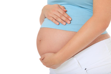 Fototapeta na wymiar Kobieta w ciąży gospodarstwa jej brzuszek