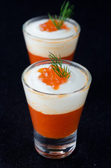 appetizer of sweet pepper, cream and red caviar in glasses