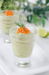 Avocado mousse with caviar portions closeup