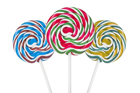 Three colorful spiral lollipops