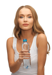 young beautiful woman with  bottle of water