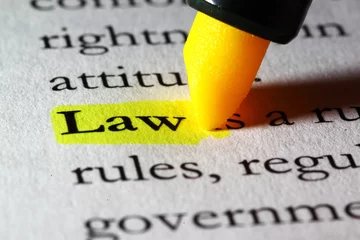 Word law highlighted with a yellow marker © mattiaath