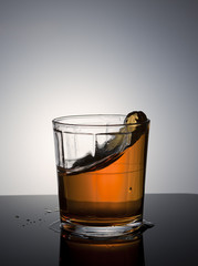 Liquid splashed in glass.