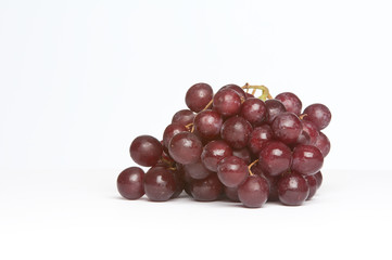 Red grapes isolated on white