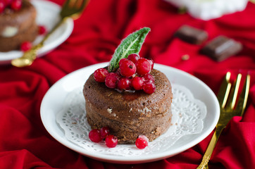 Chocolate cake with currants and mint
