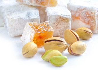 Turkish delight (lokum) with pistachios on a white background