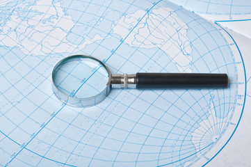 magnifier and world map