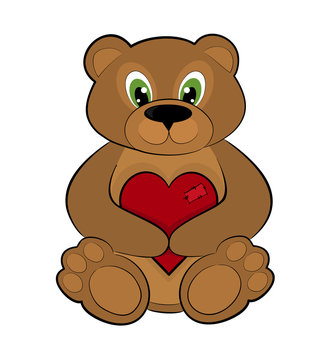 Teddy bear holding a red heart