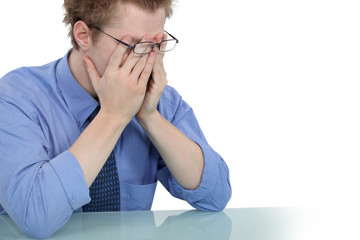 young businessman looking tired