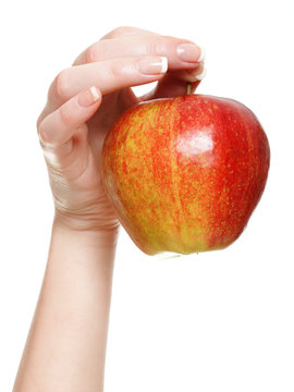 Woman hand with red apple isolated