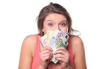 girl with money with a happy face on a white background