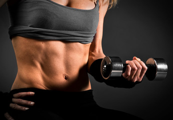Fit woman abdomen muscle definition - obrazy, fototapety, plakaty