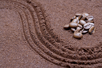 Fototapeta na wymiar Coffee bean on coffee flour background