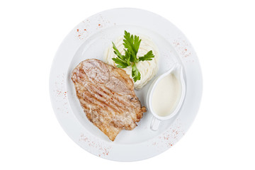 stake with mashed potatoes and sauce