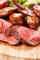 sausages on a wooden cutting board
