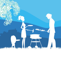 Happy family with barbecue outdoors