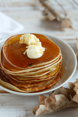 Maple syrup pancakes with orange butter